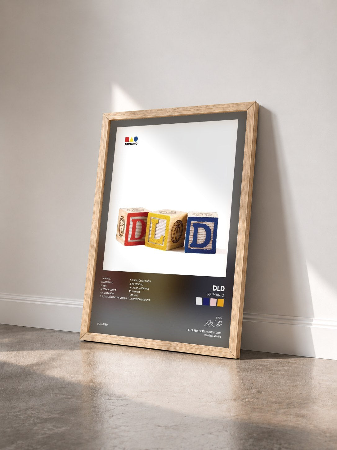 #bois Tableau de l'album Primario de DLD vu de trois quarts, cadre en bois brut
