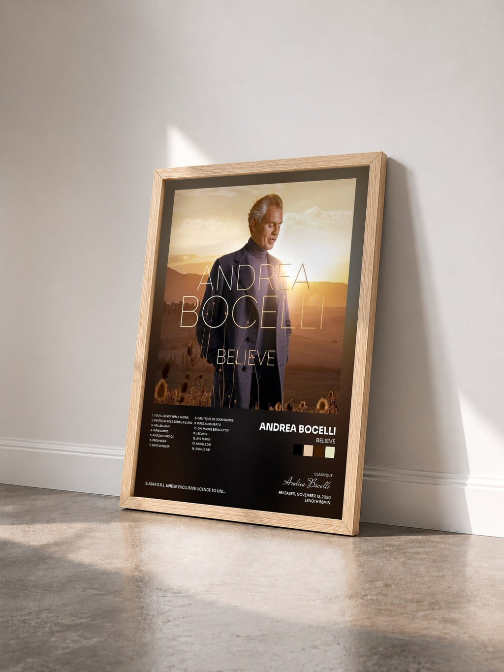 #bois Tableau de l'album Believe de Andrea Bocelli vu de trois quarts, cadre en bois brut