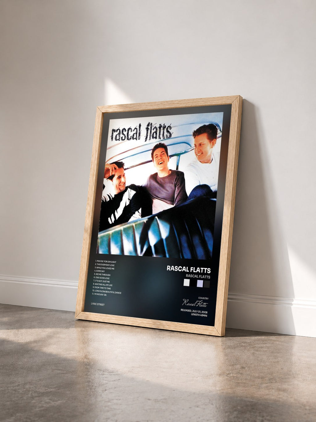 #bois Tableau de l'album Rascal Flatts de Rascal Flatts vu de trois quarts, cadre en bois brut