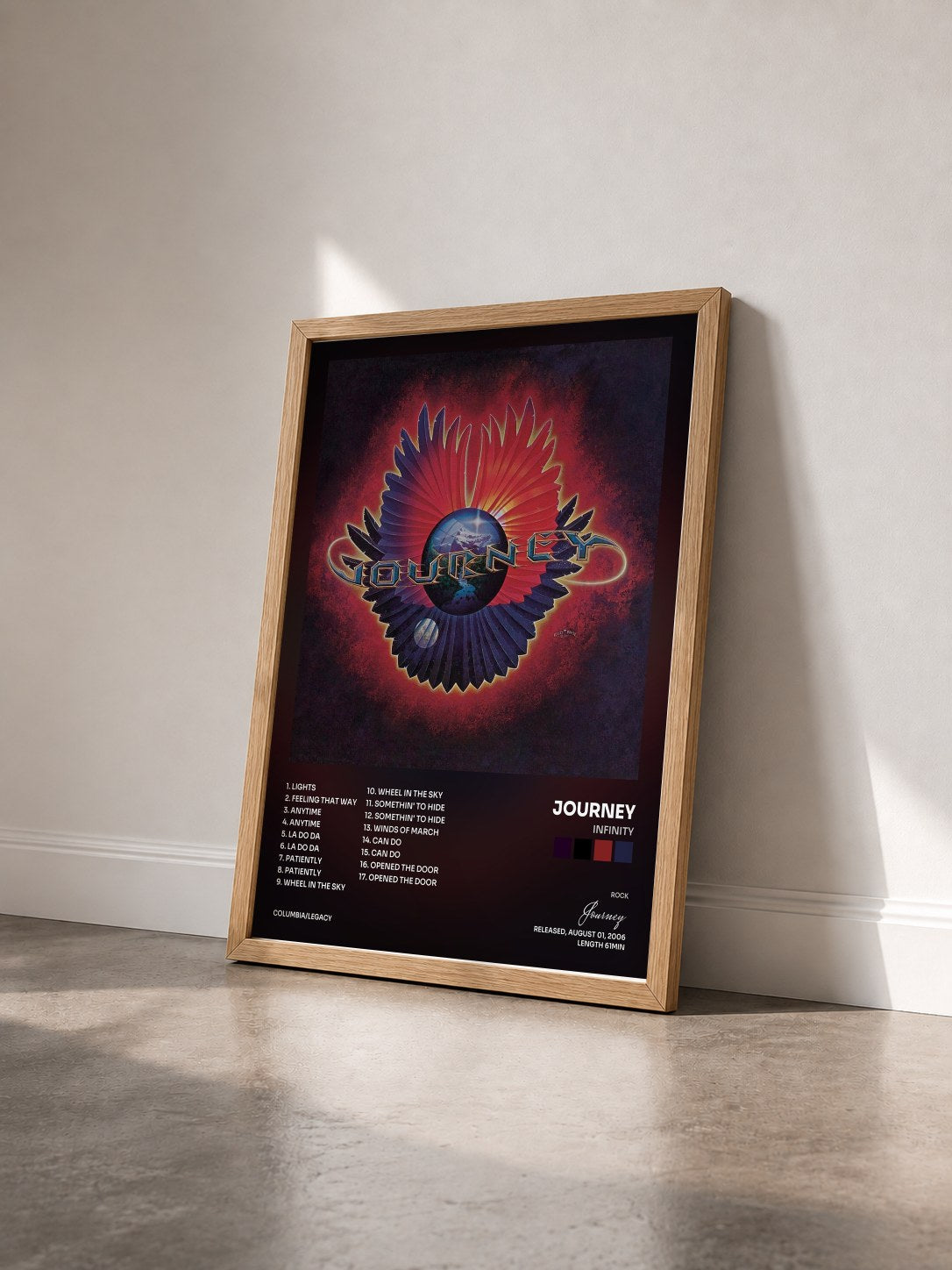 #bois Tableau de l'album Infinity de Journey vu de trois quarts, cadre en bois brut