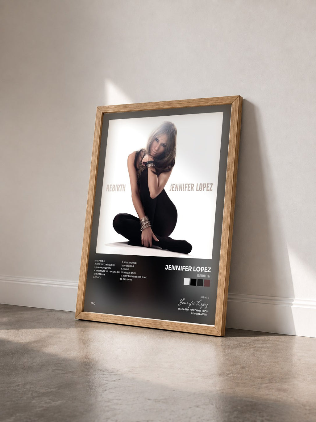 #bois Tableau de l'album Rebirth de Jennifer Lopez vu de trois quarts, cadre en bois brut