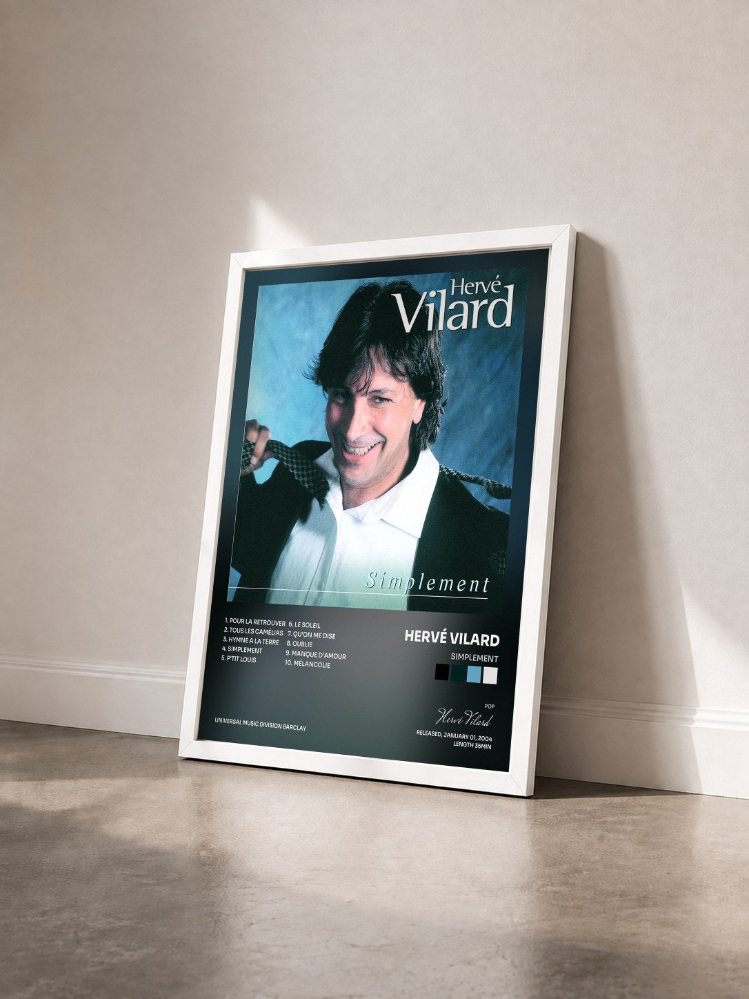 #blanc Tableau de l'album Simplement de Hervé Vilard vu de trois quarts, cadre blanc