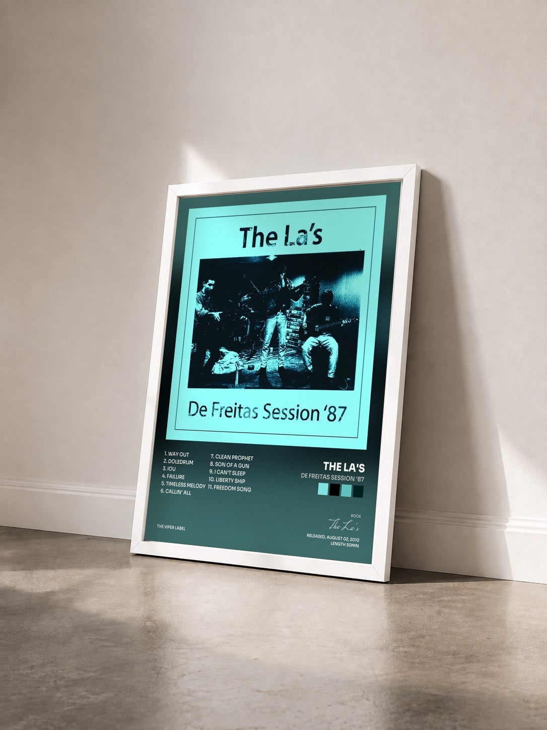 #blanc Tableau de l'album De Freitas Session '87 de The La's vu de trois quarts, cadre blanc