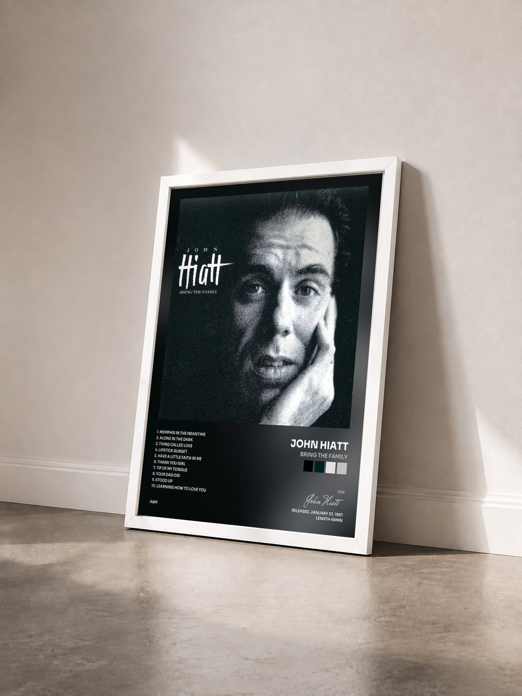 #blanc Tableau de l'album Bring The Family de John Hiatt vu de trois quarts, cadre blanc