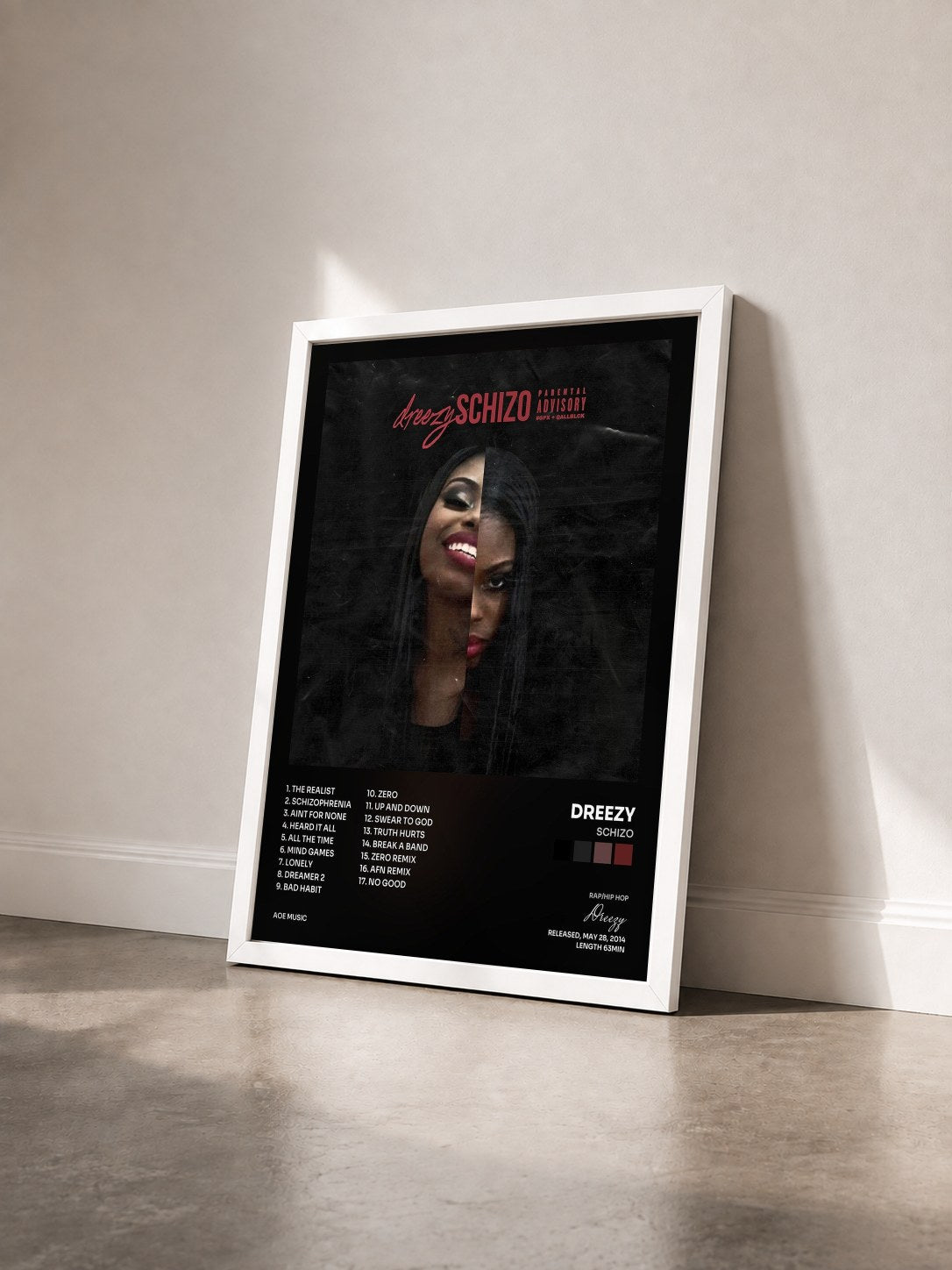 #blanc Tableau de l'album Schizo de Dreezy vu de trois quarts, cadre blanc