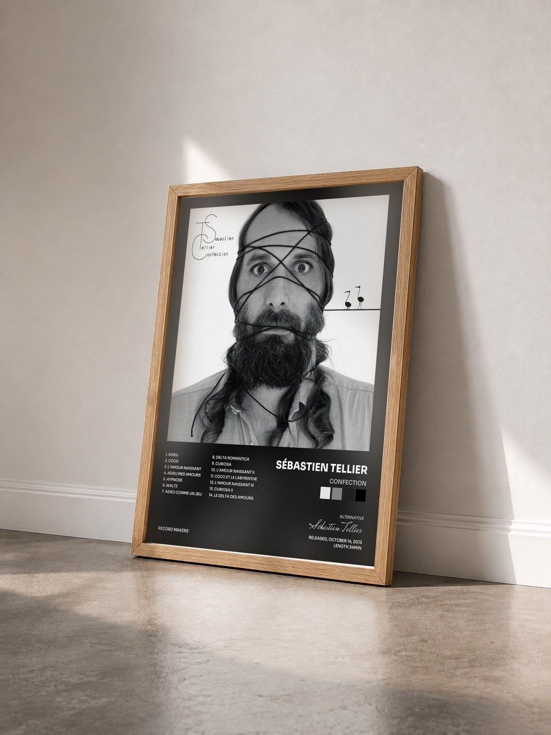 #bois Tableau de l'album Confection de Sébastien Tellier vu de trois quarts, cadre en bois brut
