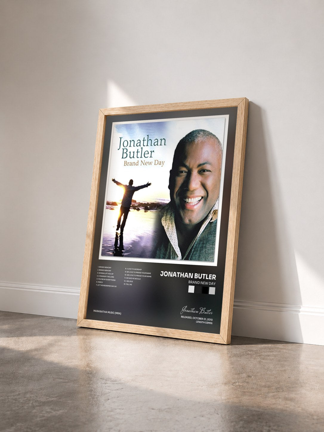 #bois Tableau de l'album Brand New Day de Jonathan Butler vu de trois quarts, cadre en bois brut