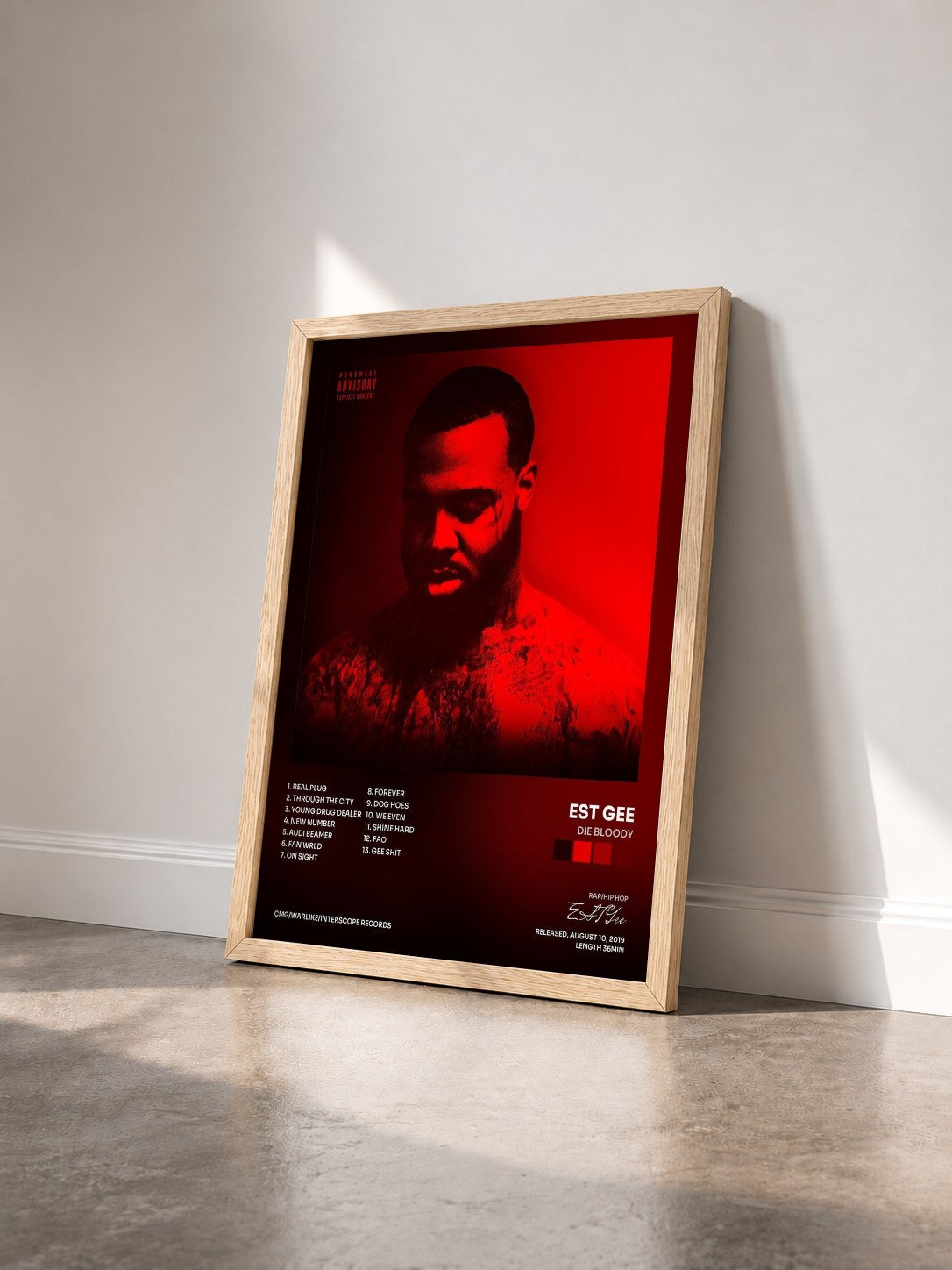 #bois Tableau de l'album Die Bloody de EST Gee vu de trois quarts, cadre en bois brut