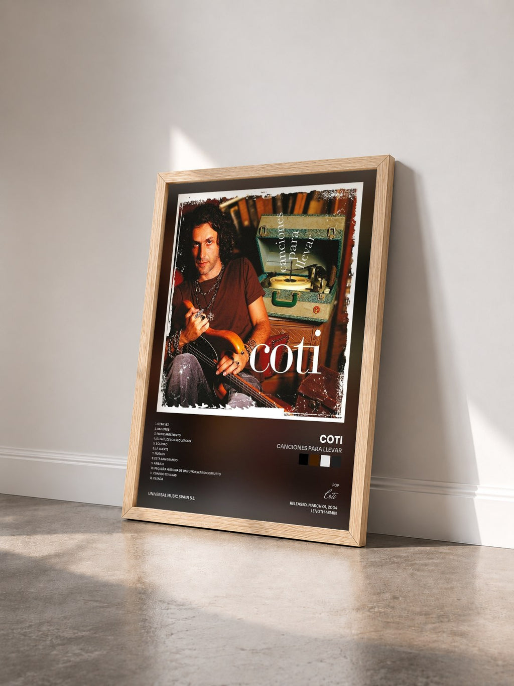 #bois Tableau de l'album Canciones Para Llevar de Coti vu de trois quarts, cadre en bois brut