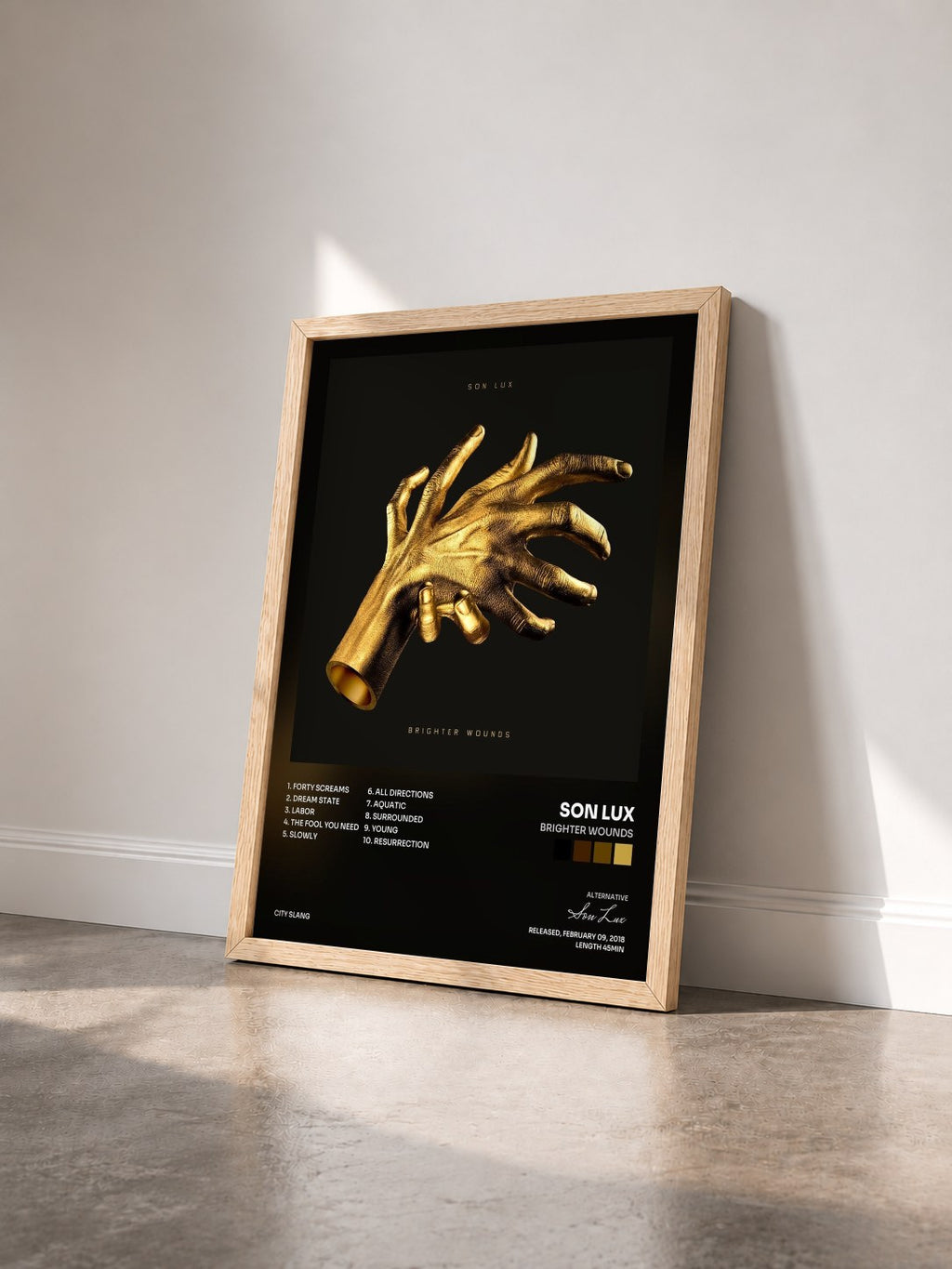 #bois Tableau de l'album Brighter Wounds de Son Lux vu de trois quarts, cadre en bois brut