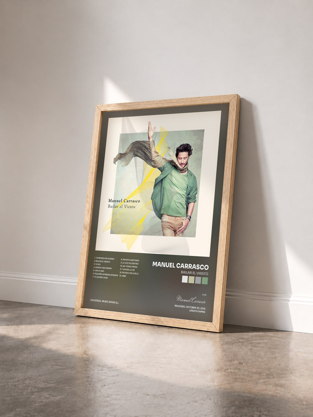 #bois Tableau de l'album Bailar El Viento de Manuel Carrasco vu de trois quarts, cadre en bois brut