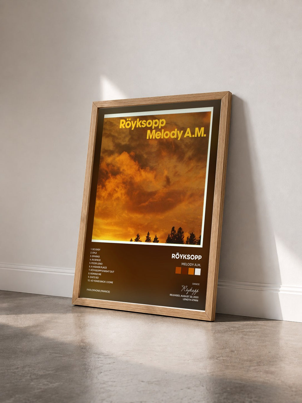#bois Tableau de l'album Melody A.M. de Röyksopp vu de trois quarts, cadre en bois brut