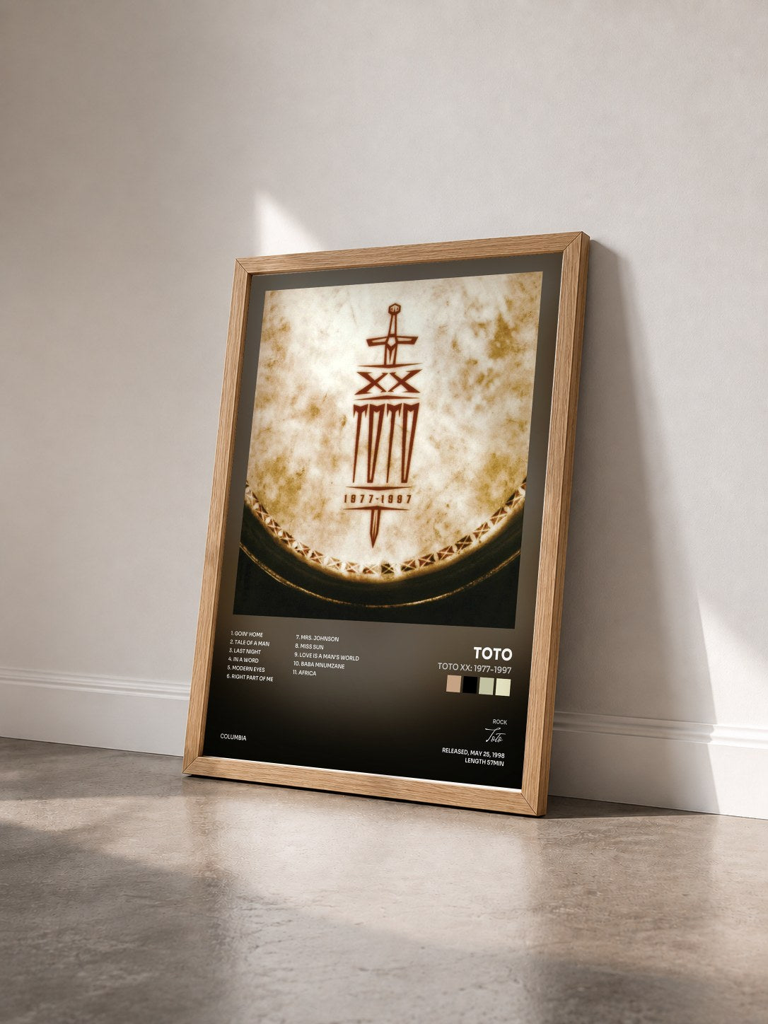 #bois Tableau de l'album Toto XX: 1977-1997 de Toto vu de trois quarts, cadre en bois brut