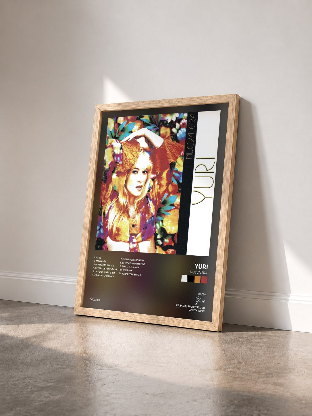 #bois Tableau de l'album NUEVA ERA de Yuri vu de trois quarts, cadre en bois brut