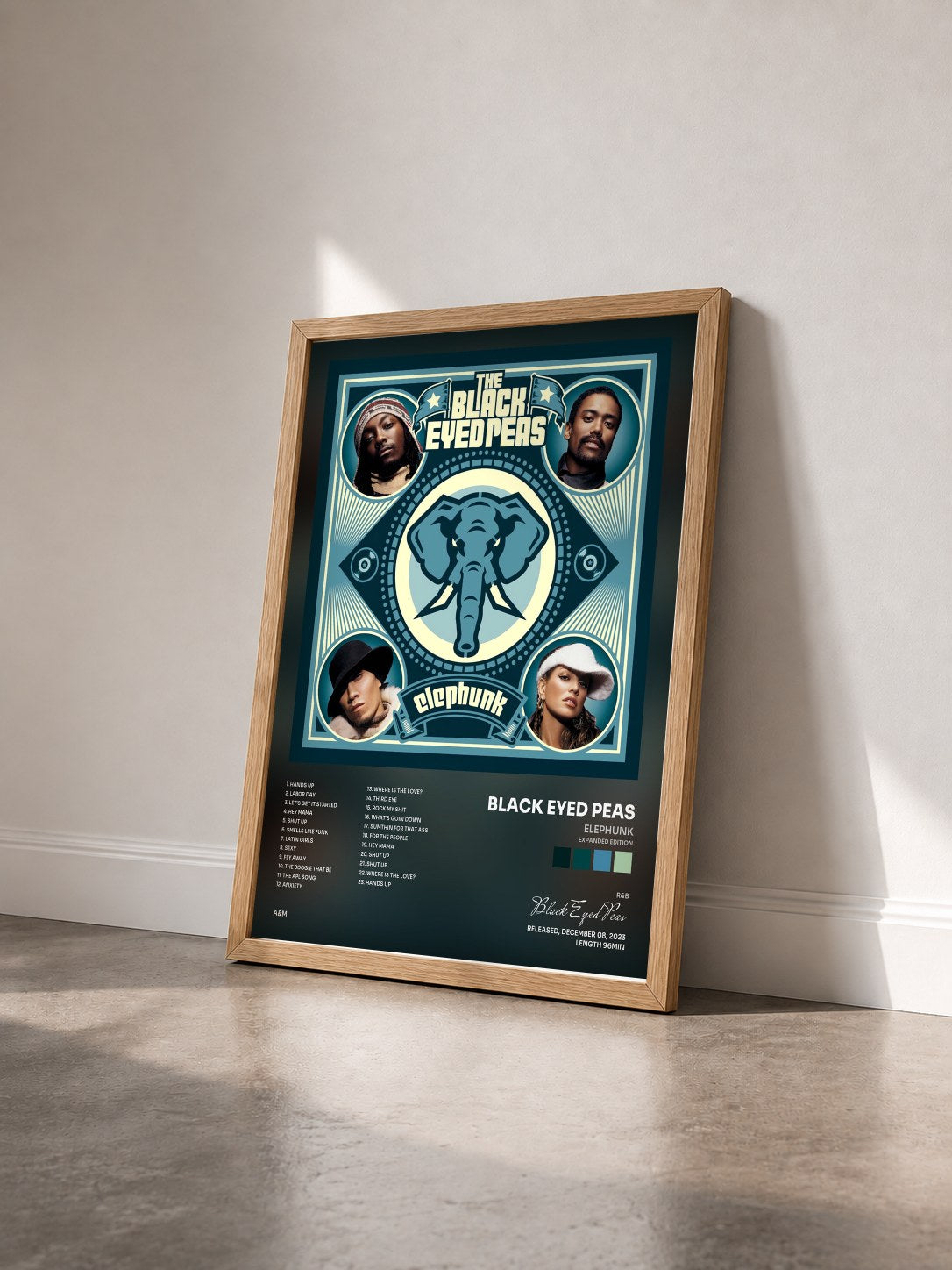 #bois Tableau de l'album Elephunk (Expanded Edition) de Black Eyed Peas vu de trois quarts, cadre en bois brut