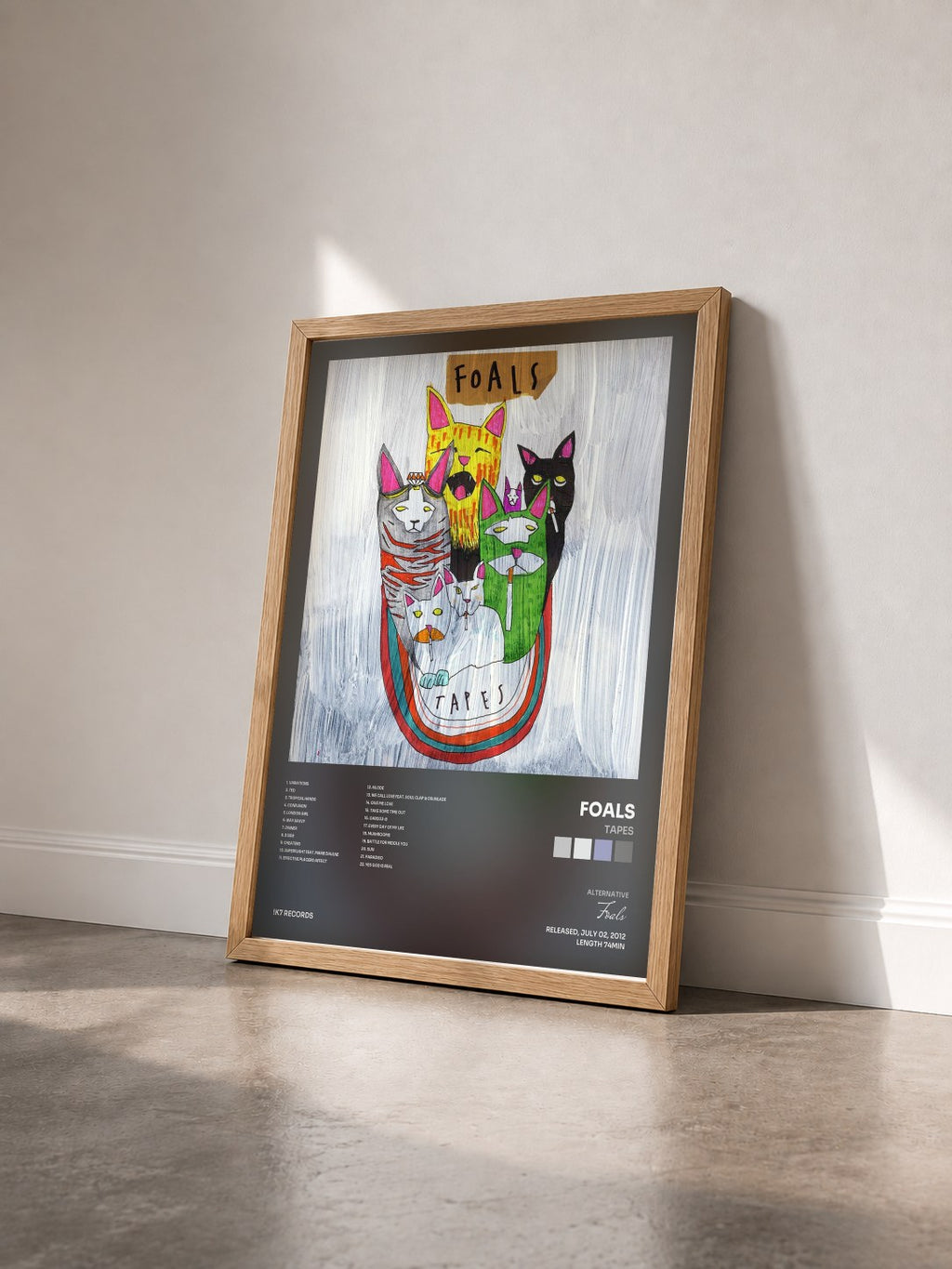 #bois Tableau de l'album Tapes de Foals vu de trois quarts, cadre en bois brut