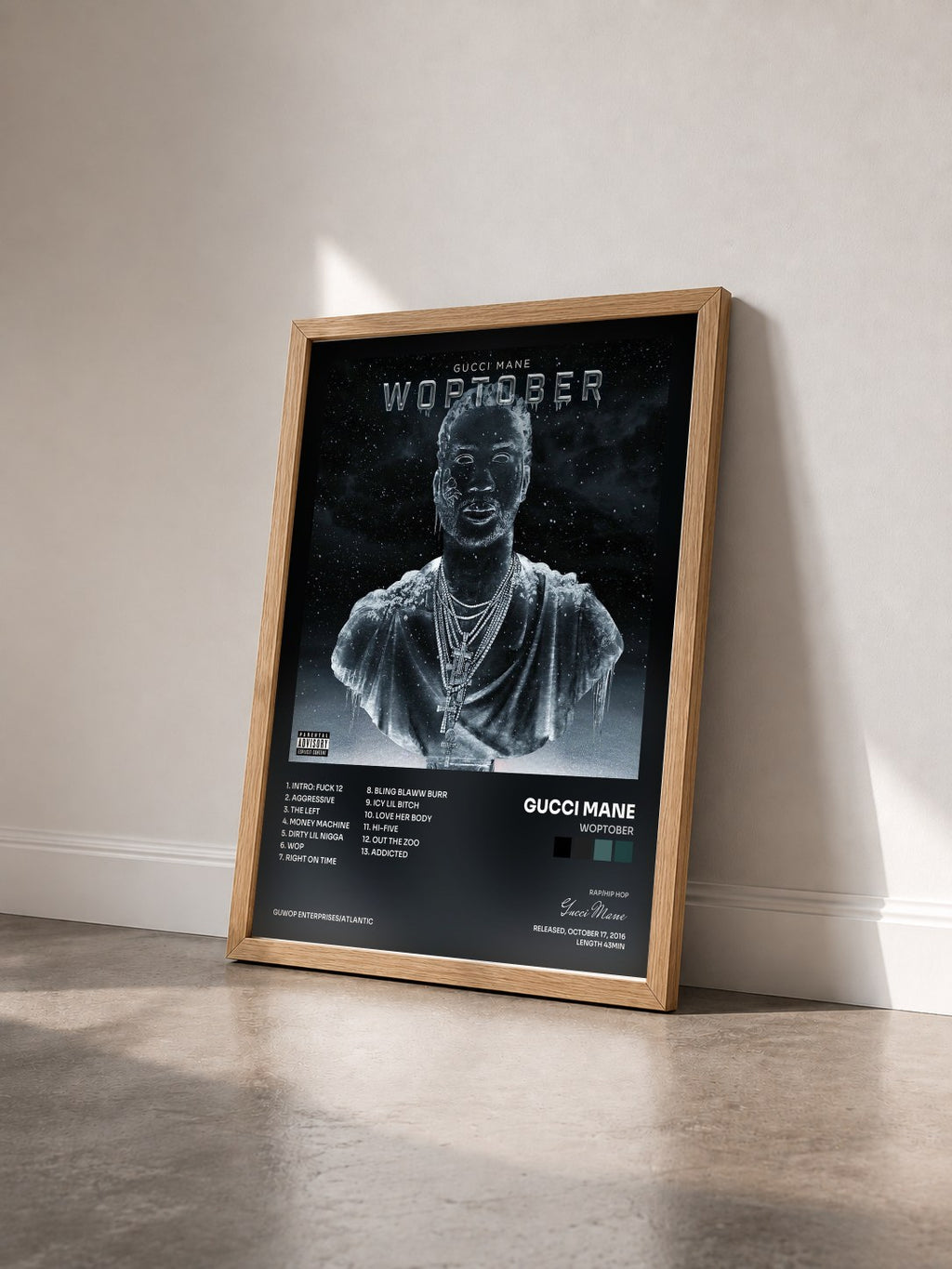 #bois Tableau de l'album WOPTOBER de Gucci Mane vu de trois quarts, cadre en bois brut