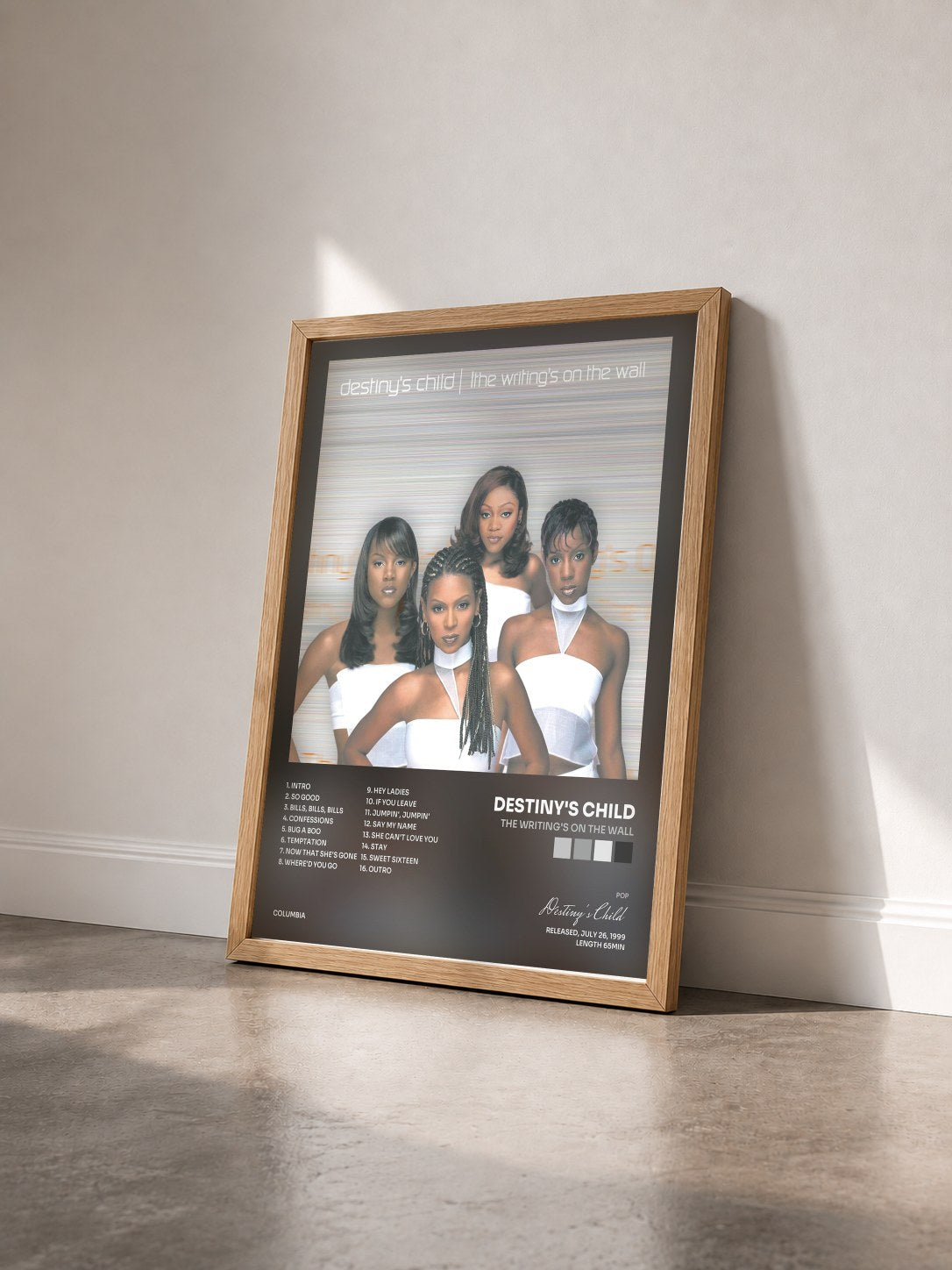 #bois Tableau de l'album The Writing's On The Wall de Destiny's Child vu de trois quarts, cadre en bois brut