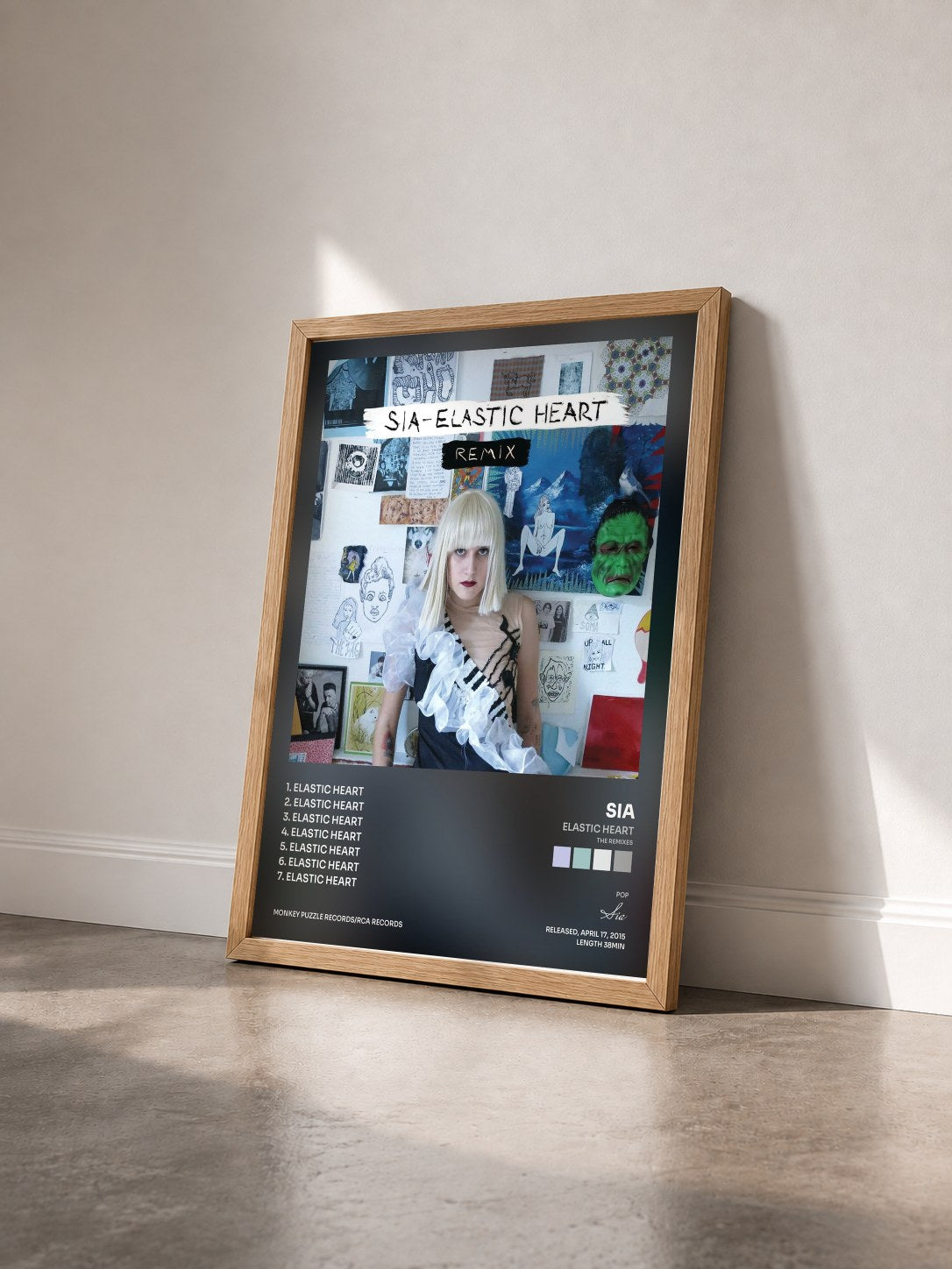 #bois Tableau de l'album Elastic Heart (The Remixes) de Sia vu de trois quarts, cadre en bois brut
