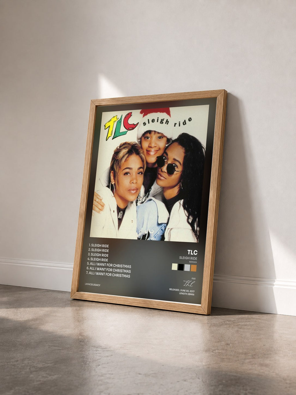 #bois Tableau de l'album Sleigh Ride (Remixes) de TLC vu de trois quarts, cadre en bois brut