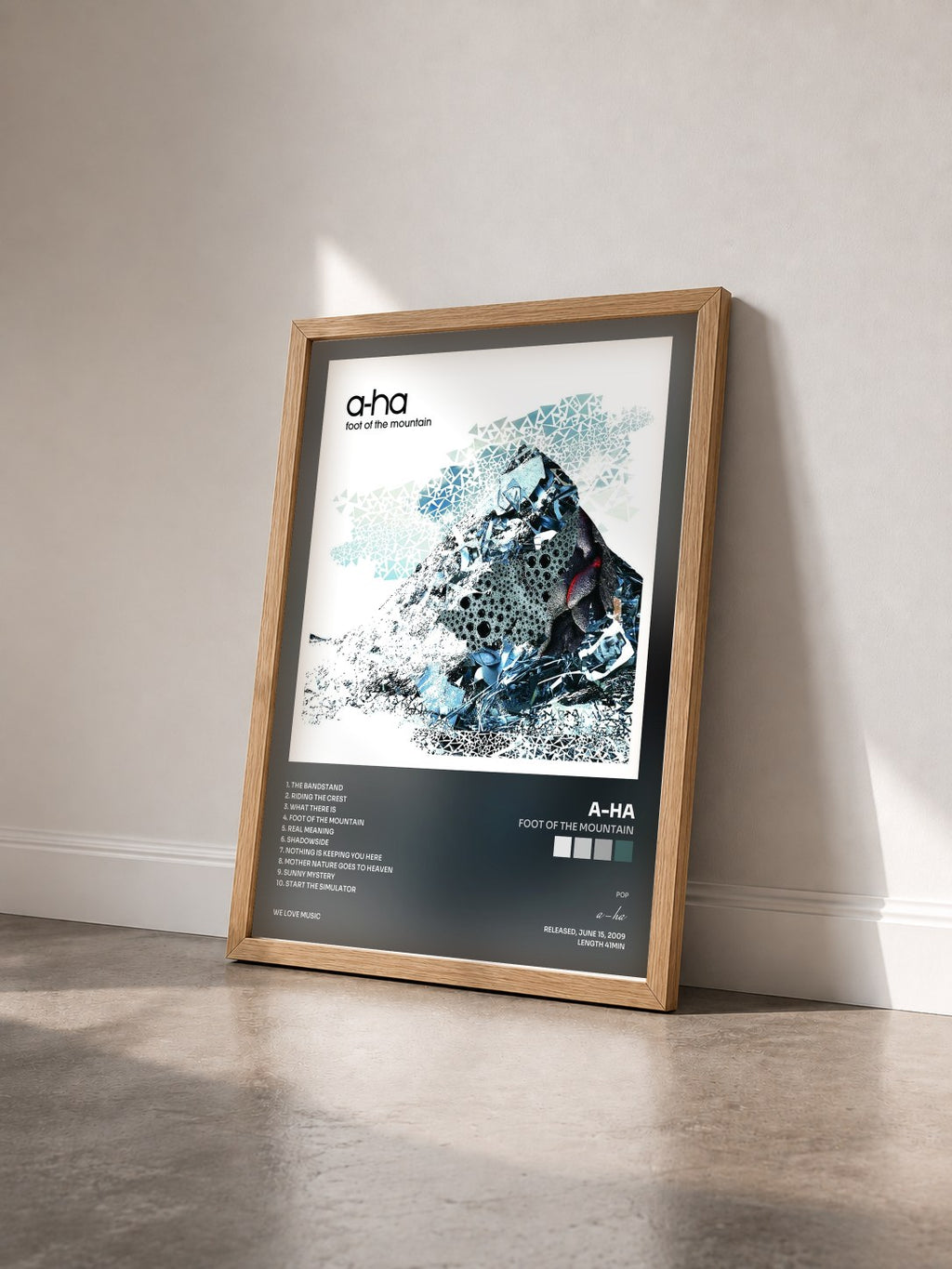 #bois Tableau de l'album Foot Of The Mountain de a-ha vu de trois quarts, cadre en bois brut