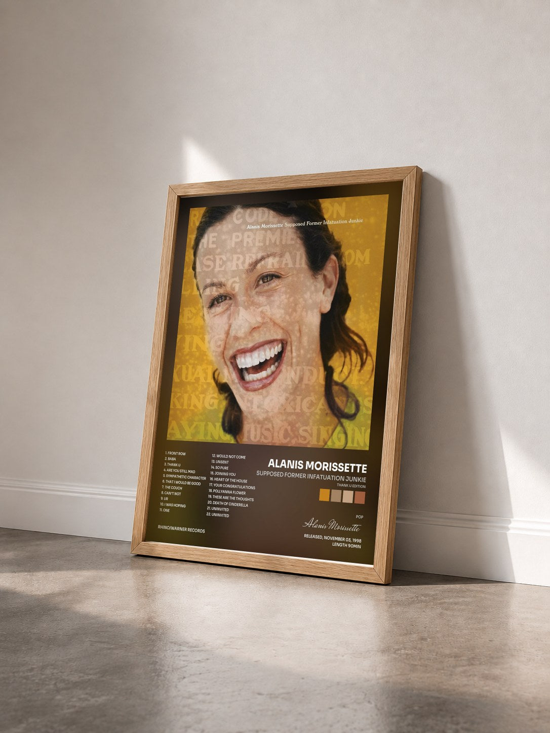 #bois Tableau de l'album Supposed Former Infatuation Junkie (Thank U Edition) de Alanis Morissette vu de trois quarts, cadre en bois brut