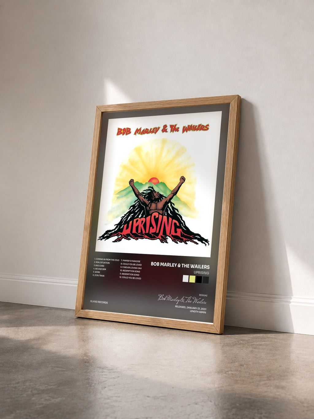 #bois Tableau de l'album Uprising de Bob Marley & The Wailers vu de trois quarts, cadre en bois brut