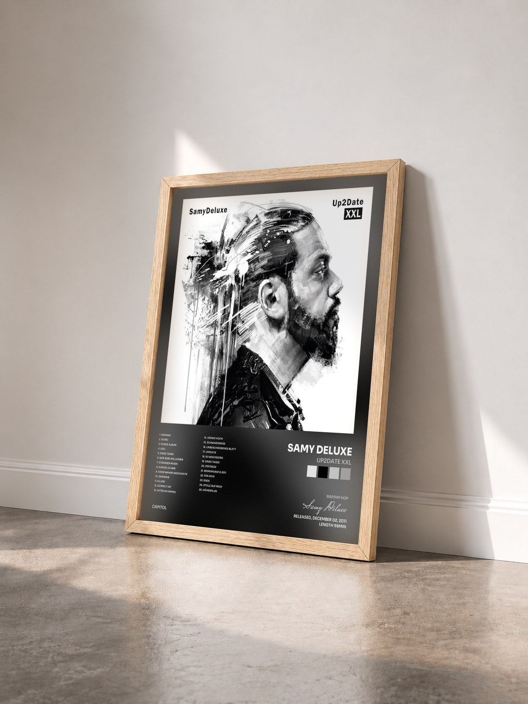 #bois Tableau de l'album Up2Date XXL de Samy Deluxe vu de trois quarts, cadre en bois brut