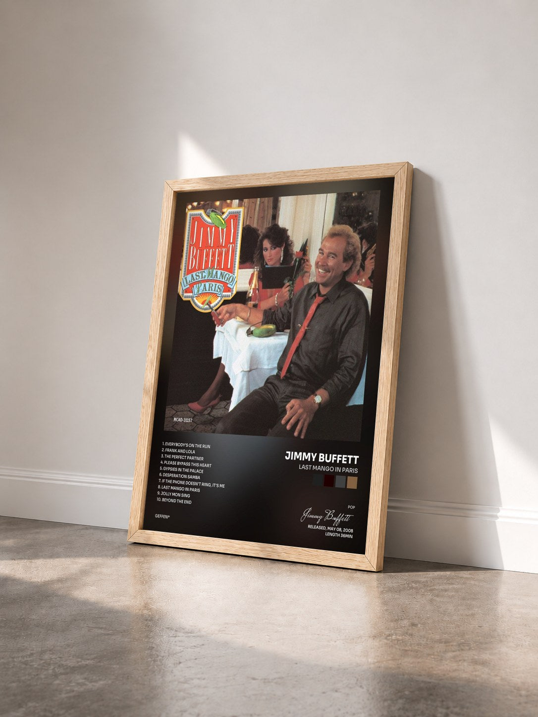 #bois Tableau de l'album Last Mango In Paris de Jimmy Buffett vu de trois quarts, cadre en bois brut