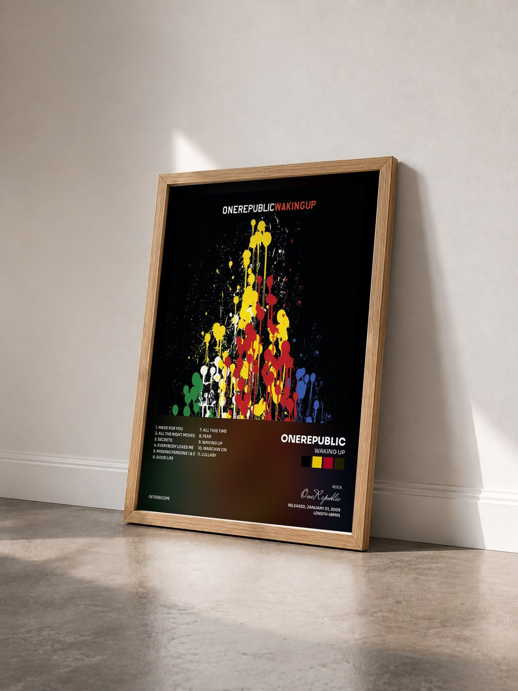 #bois Tableau de l'album Waking Up de OneRepublic vu de trois quarts, cadre en bois brut