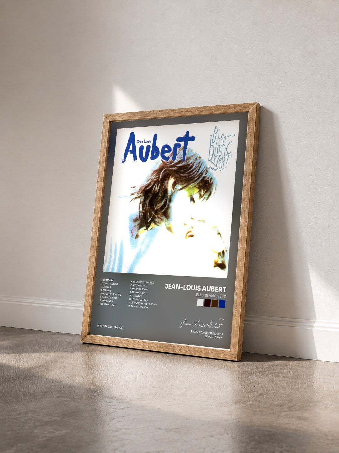 #bois Tableau de l'album bleu blanc vert de Jean-Louis Aubert vu de trois quarts, cadre en bois brut