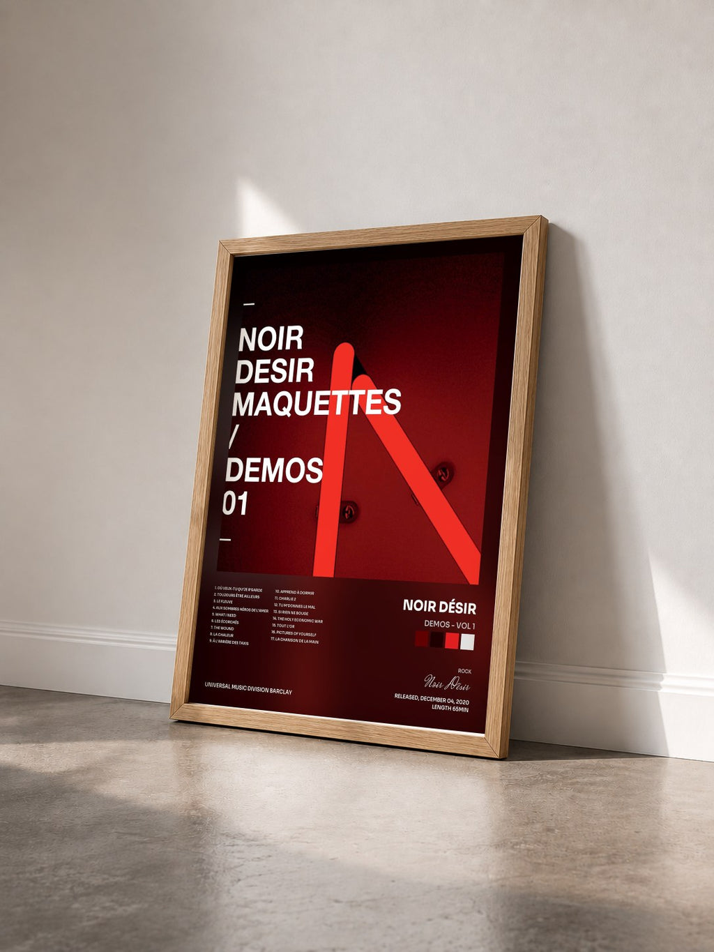 #bois Tableau de l'album Demos - Vol 1 de Noir Désir vu de trois quarts, cadre en bois brut