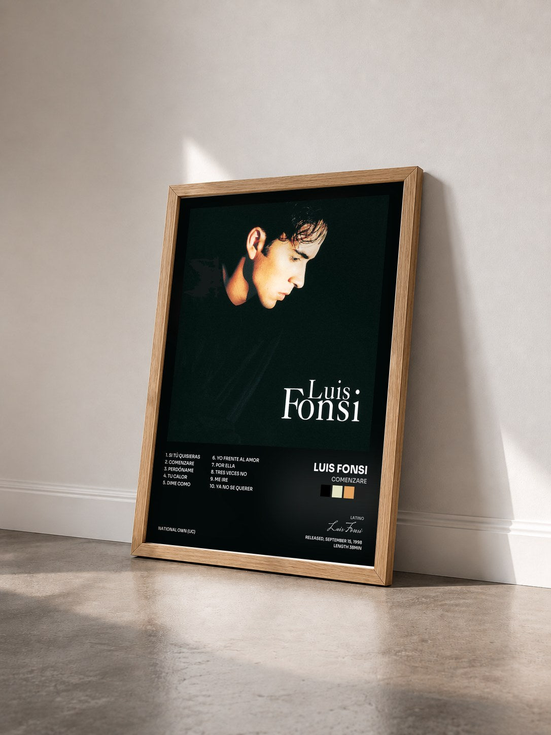#bois Tableau de l'album Comenzare de Luis Fonsi vu de trois quarts, cadre en bois brut