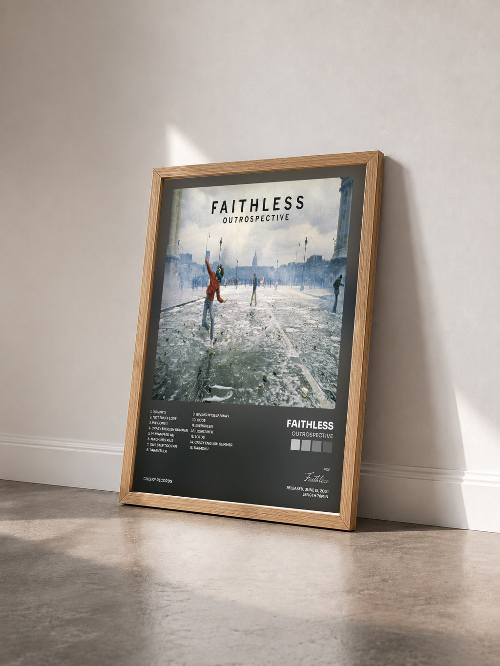 #bois Tableau de l'album Outrospective de Faithless vu de trois quarts, cadre en bois brut