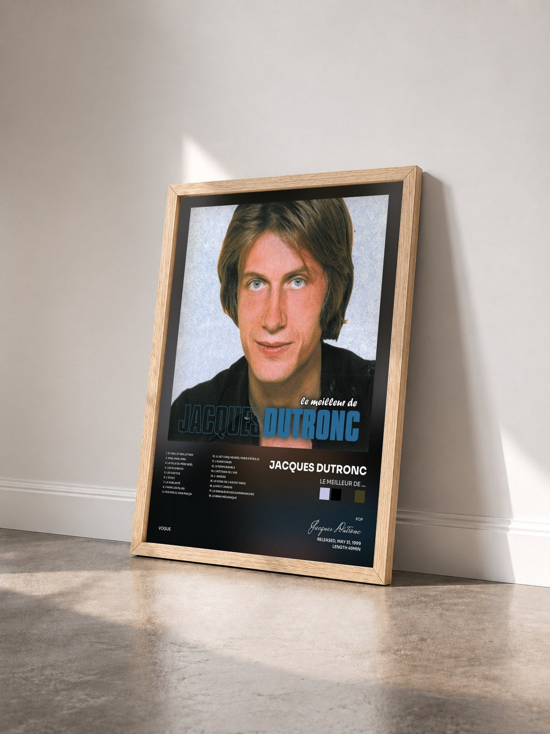 #bois Tableau de l'album Le meilleur de ... de Jacques Dutronc vu de trois quarts, cadre en bois brut