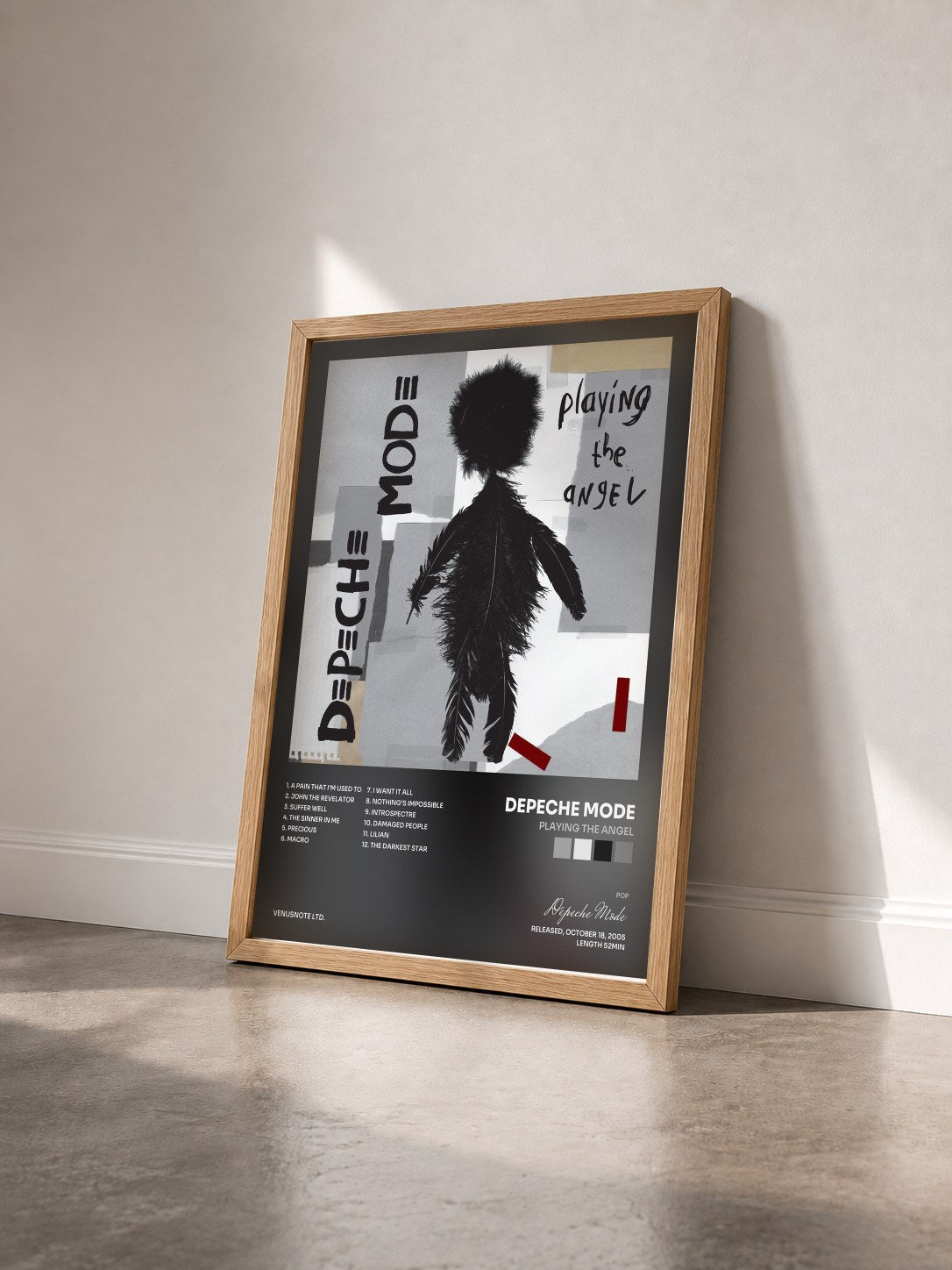 #bois Tableau de l'album Playing The Angel de Depeche Mode vu de trois quarts, cadre en bois brut
