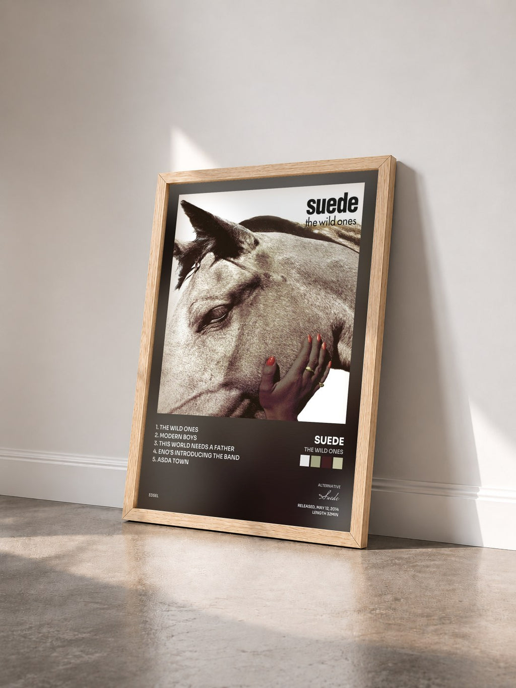 #bois Tableau de l'album The Wild Ones de Suede vu de trois quarts, cadre en bois brut