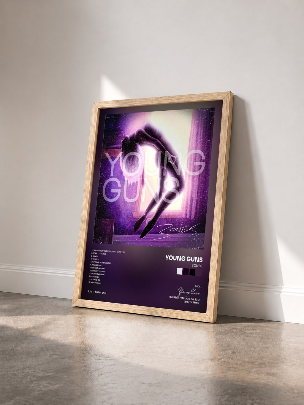 #bois Tableau de l'album Bones de Young Guns vu de trois quarts, cadre en bois brut