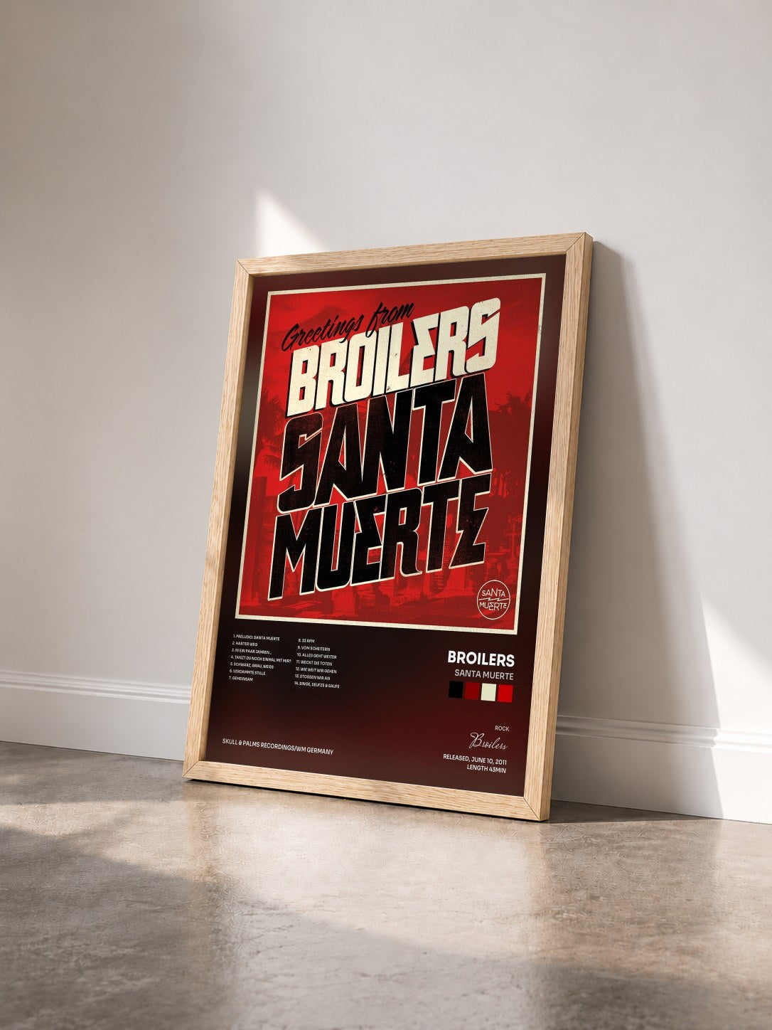 #bois Tableau de l'album Santa Muerte de Broilers vu de trois quarts, cadre en bois brut