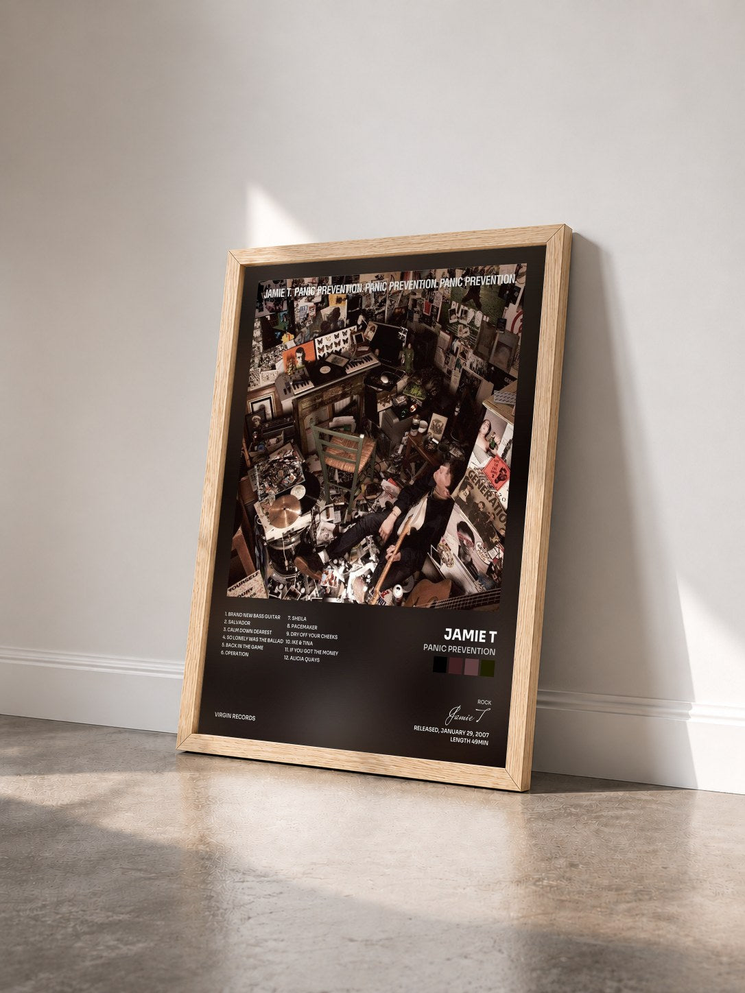 #bois Tableau de l'album Panic Prevention de Jamie T vu de trois quarts, cadre en bois brut