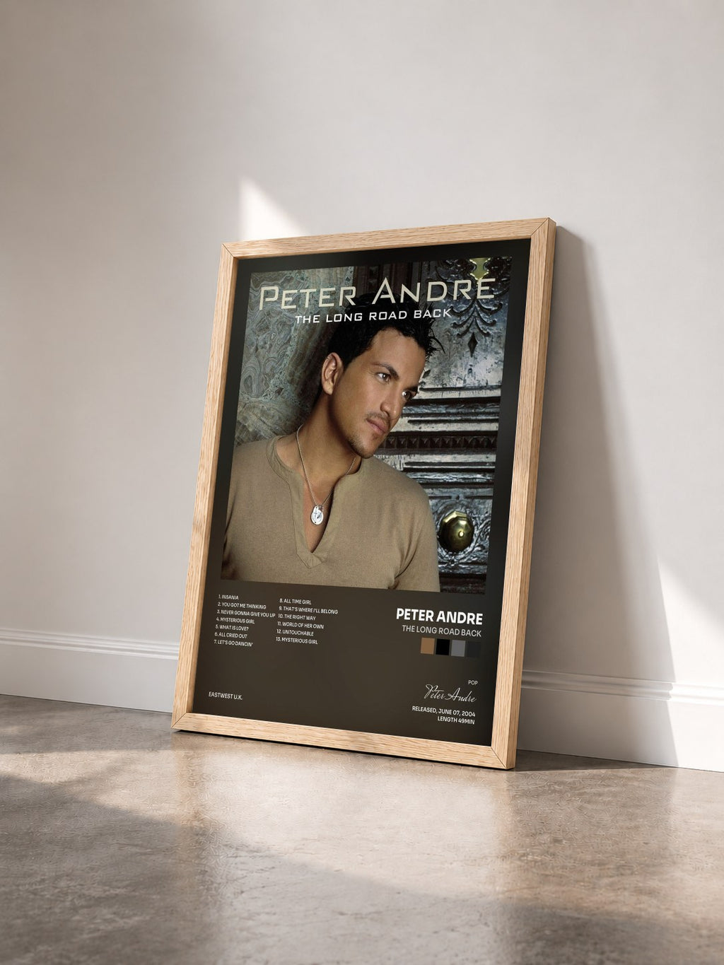#bois Tableau de l'album The Long Road Back de Peter Andre vu de trois quarts, cadre en bois brut