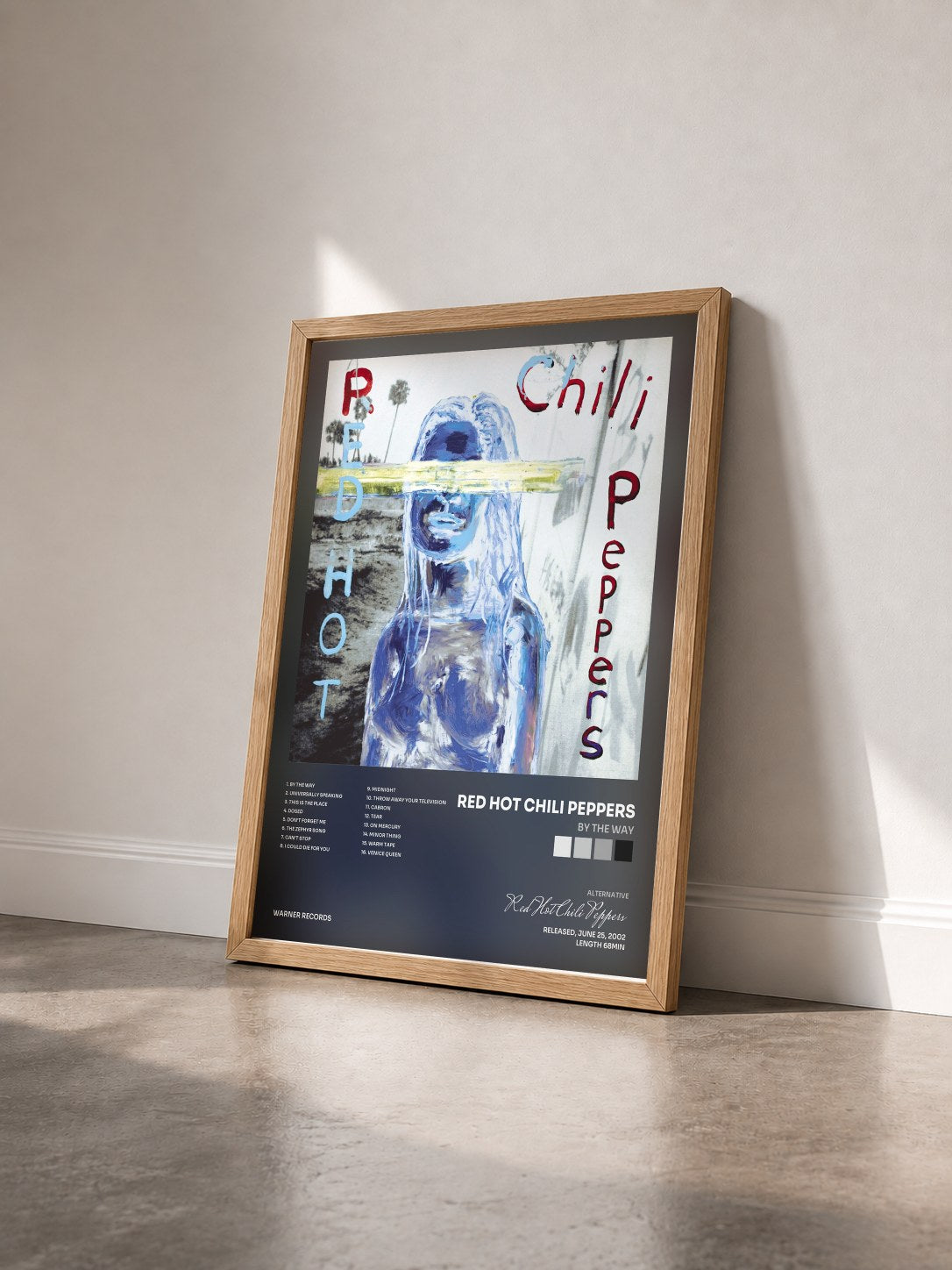 #bois Tableau de l'album By the Way de Red Hot Chili Peppers vu de trois quarts, cadre en bois brut