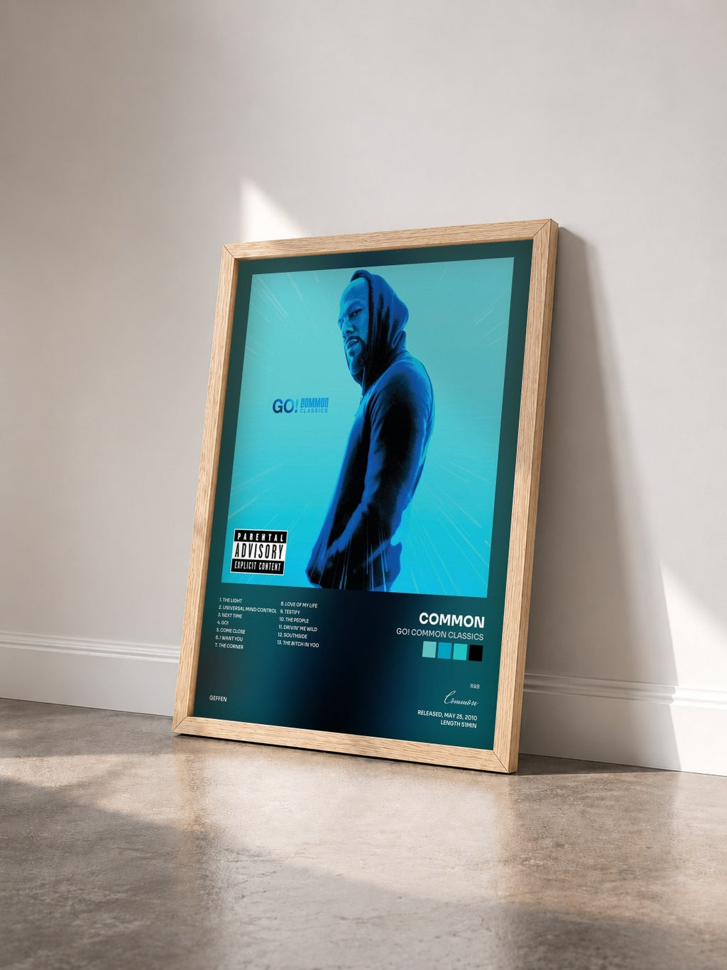 #bois Tableau de l'album Go! Common Classics de Common vu de trois quarts, cadre en bois brut