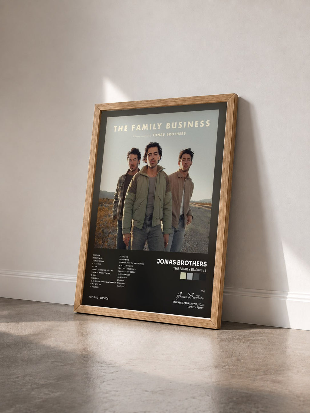 #bois Tableau de l'album The Family Business de Jonas Brothers vu de trois quarts, cadre en bois brut