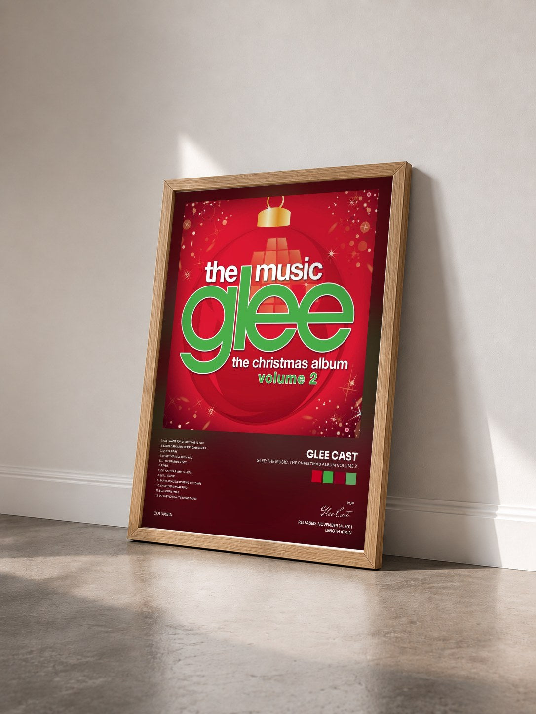 #bois Tableau de l'album Glee: The Music, The Christmas Album Volume 2 de Glee Cast vu de trois quarts, cadre en bois brut