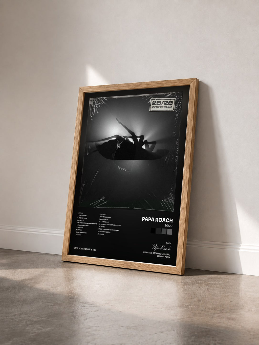 #bois Tableau de l'album 20/20 de Papa Roach vu de trois quarts, cadre en bois brut