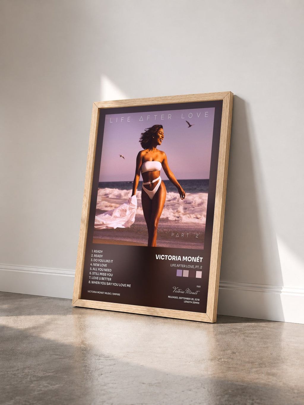 #bois Tableau de l'album Life After Love, Pt. 2 de Victoria Monét vu de trois quarts, cadre en bois brut