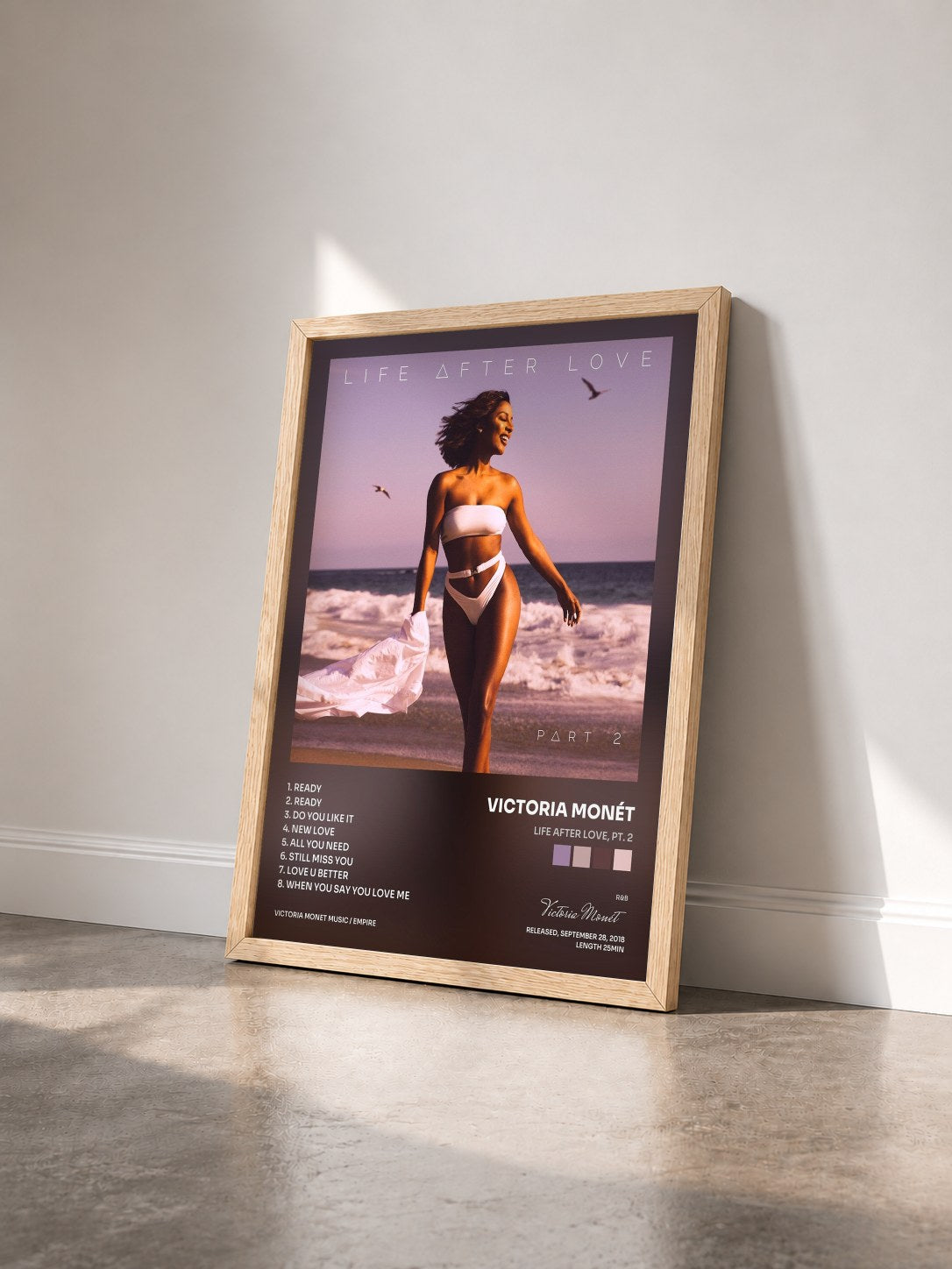 #bois Tableau de l'album Life After Love, Pt. 2 de Victoria Monét vu de trois quarts, cadre en bois brut