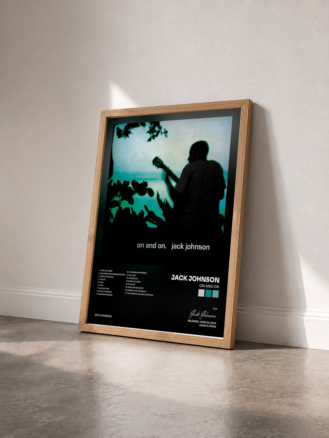#bois Tableau de l'album On and On de Jack Johnson vu de trois quarts, cadre en bois brut