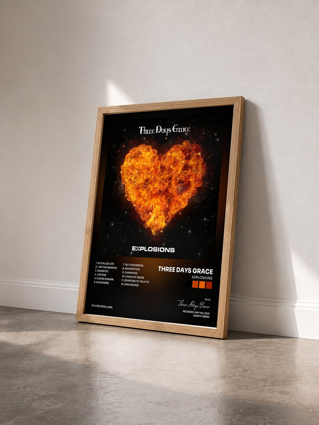 #bois Tableau de l'album EXPLOSIONS de Three Days Grace vu de trois quarts, cadre en bois brut